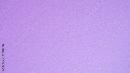Purple wall texture background. Violet and lavender wall texture backdrop design. Mauve, lilac backdrop and copy space