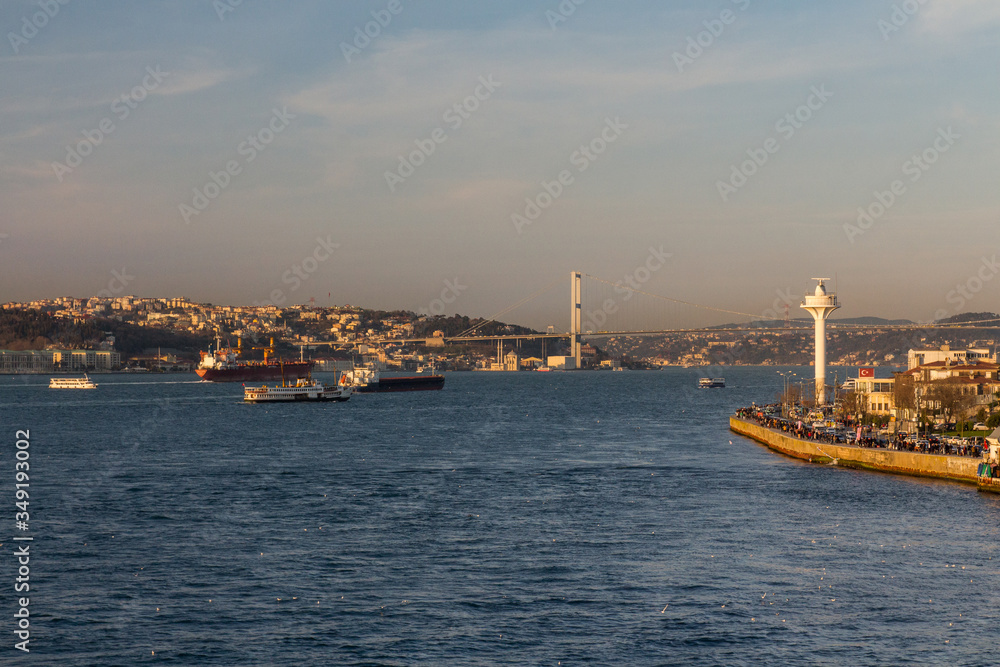 View of the Uskudar district of Istanbul from the Bosphorus at sunset. Turkey