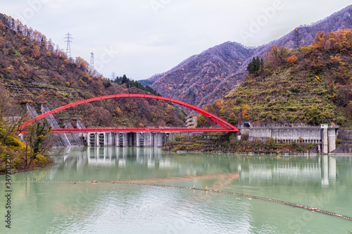 Unazuki dam, Kurobe, Japan. The dam can be seen from popular tourist train going up the Kurobe valley. photo