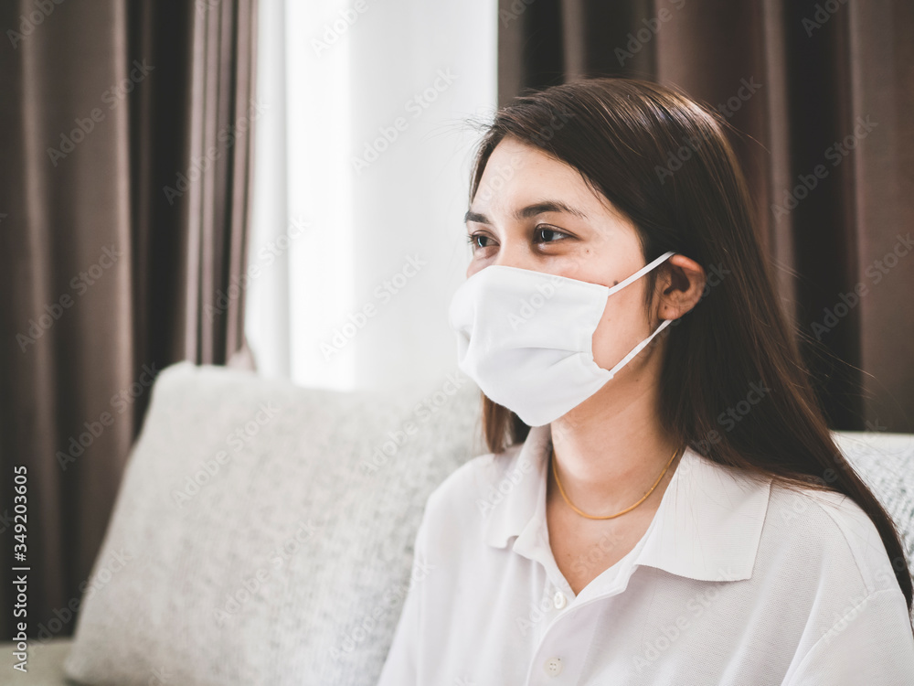 women wearing face mask stay home, in concept of Stop the spread of covid-19 or coronavirus, work from home. women wearing face mask stay home, in concept of Stop the spread of covid-19 or coronavirus, work from home.