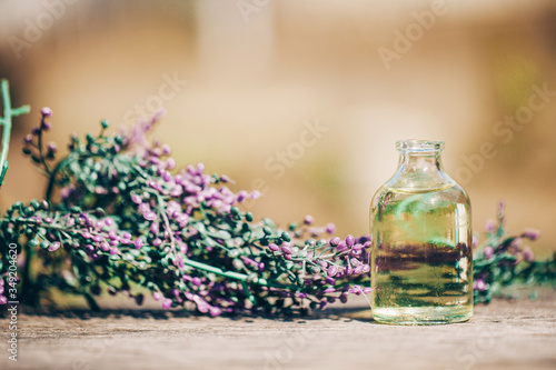 lavender essential oil. Oil spa. Flowers background. 