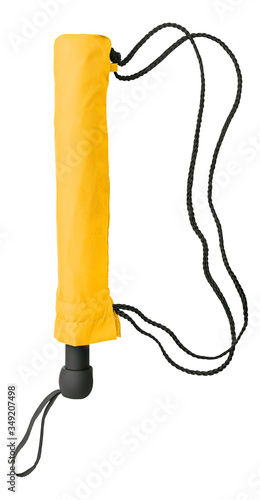 Yellow telescopic stormproof umbrella with clipping path photo