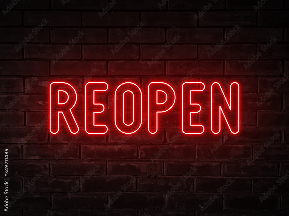 Obraz premium Reopen - red neon light word on brick wall background