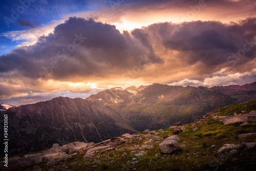 Colorful mountain sunset in the beautiful Aosta Valley in summer, from Gran Paradiso, Italian Alps