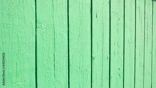 background light green wall from boards in perspective