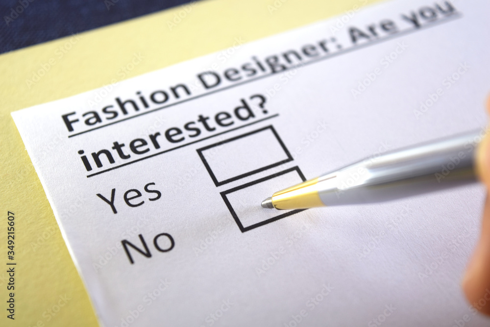 One person is answering question about fashion designer. One person is answering question about fashion designer.