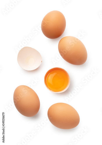 Eggs and broken eggs placed on a white background