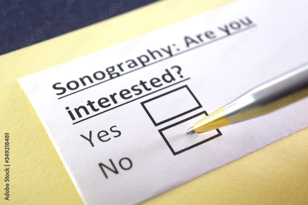 Fototapeta premium One person is answering question about sonography.