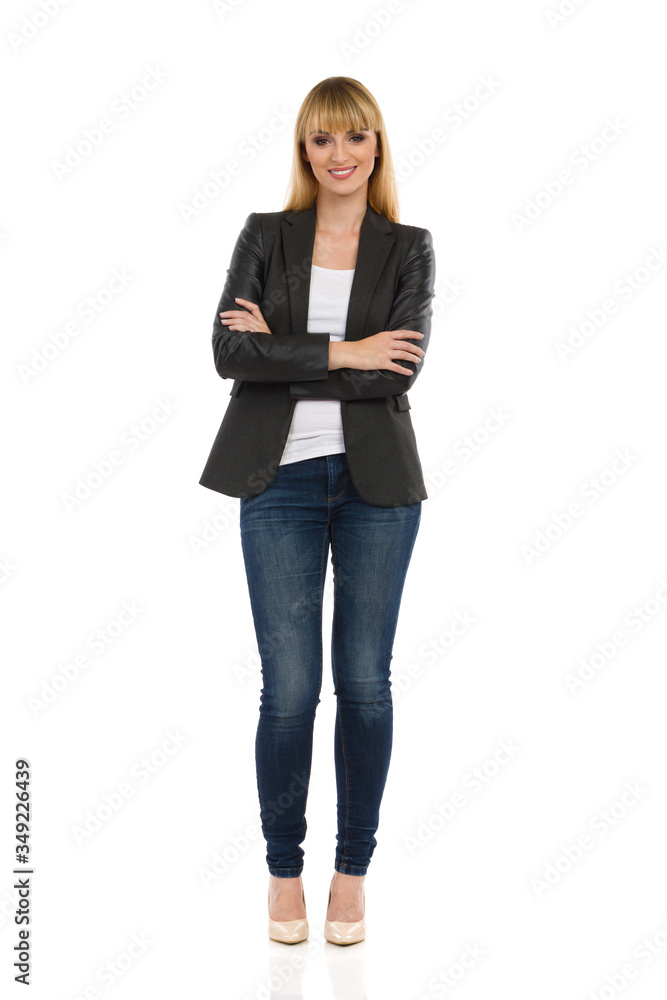Beautiful Smiling Businesswoman Is Standing With Arms Crossed Beautiful Smiling Businesswoman Is Standing With Arms Crossed