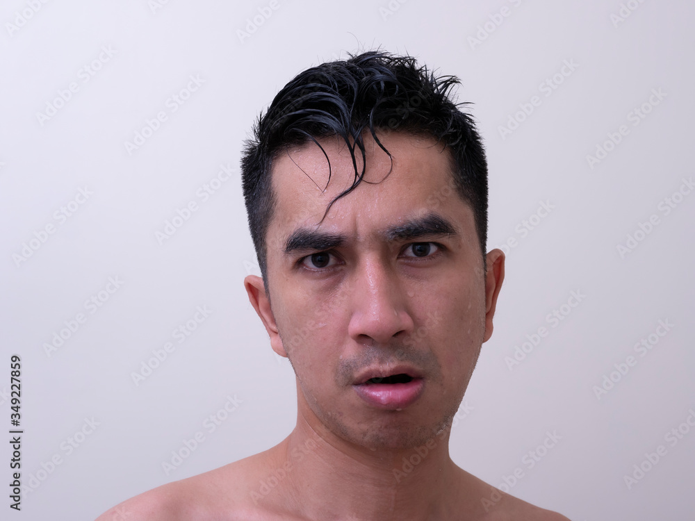 Young handsome man taking a bath Young handsome man taking a bath