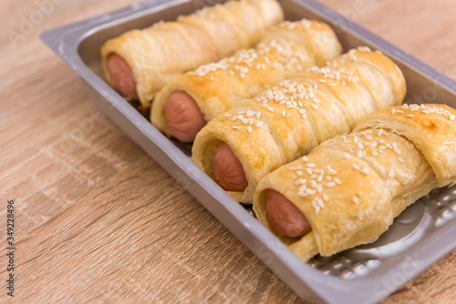 tasty roll sausages baked in dough