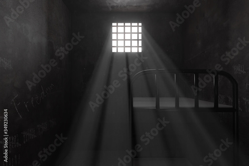 Gefängniszelle mit Stockbett und voll gekritzelten Wänden, erhellt durch Lichtschein am Fenster. 3D Rendering photo