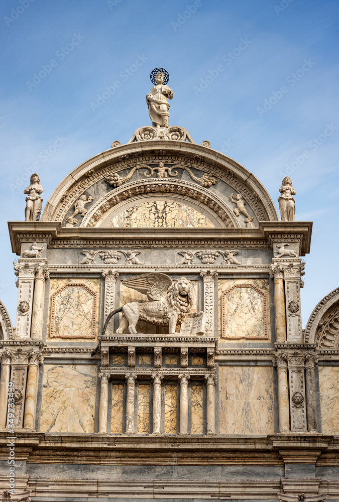 Venice. Close-up of the Scuola Grande di San Marco with the winged lion of saint Mark, building in Renaissance style. UNESCO world heritage site, Veneto, Italy, Europe