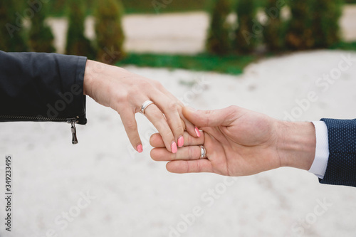 close up of romantic people shaking hands