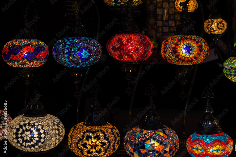 Beautiful paper lanterns in shape of stars as Christmas decorative elements lightning