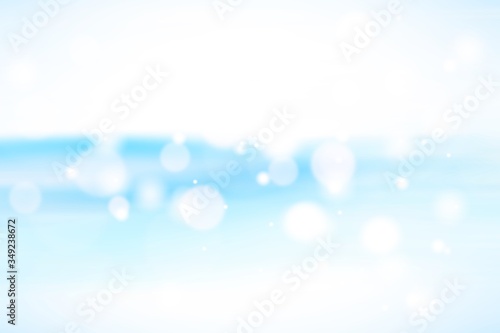 Blue abstract background. white light and snowflakes blurred beautiful shiny lights use wallpaper backdrop and your product.