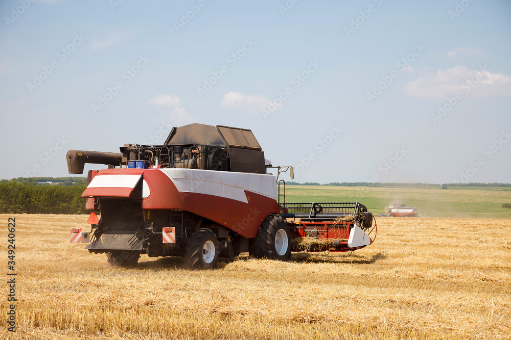 combine harvester on a wheat field combine harvester on a wheat field