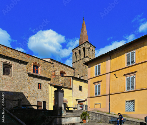Detail of narrow street in old historic alley in the medieval village of Sansepolcro near city of Arezzo in Tuscany, 