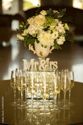 wedding table setting with flowers and glasses
