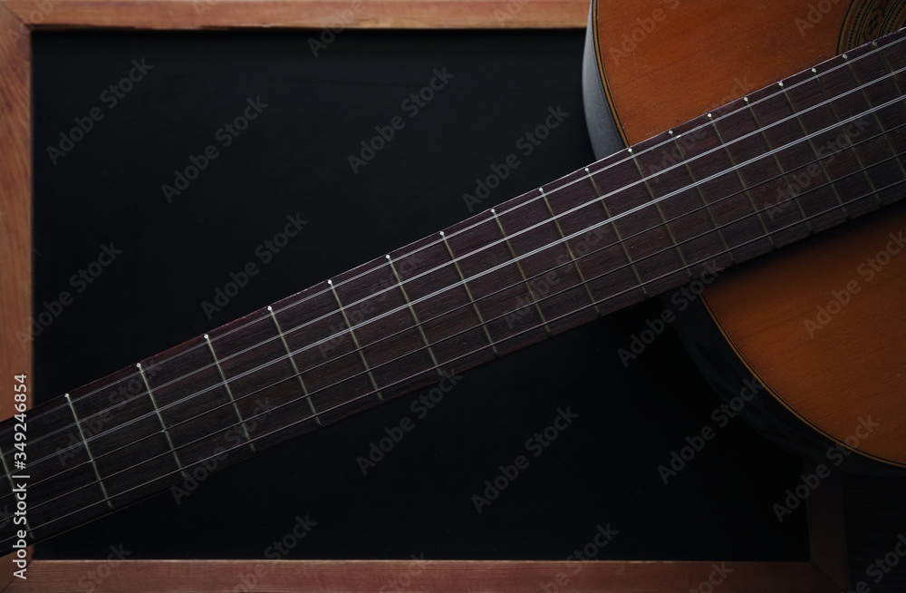 Fototapeta premium Close-up neck and upper bout of acoustic guitar