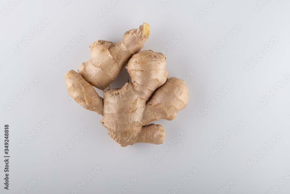 Fototapeta premium Close-up of ginger root on white background. Shallow dof