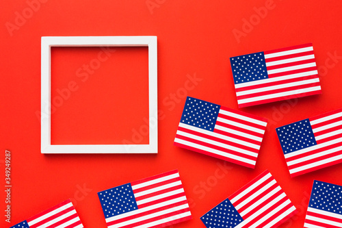 Flat lay of american flags with frame