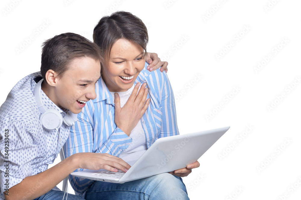 Portrait of fine family with laptop on a white background Portrait of fine family with laptop on a white background