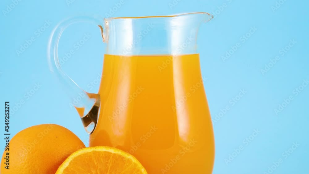 Close up of juice of squeezed orange in jug Close up of juice of squeezed orange in jug
