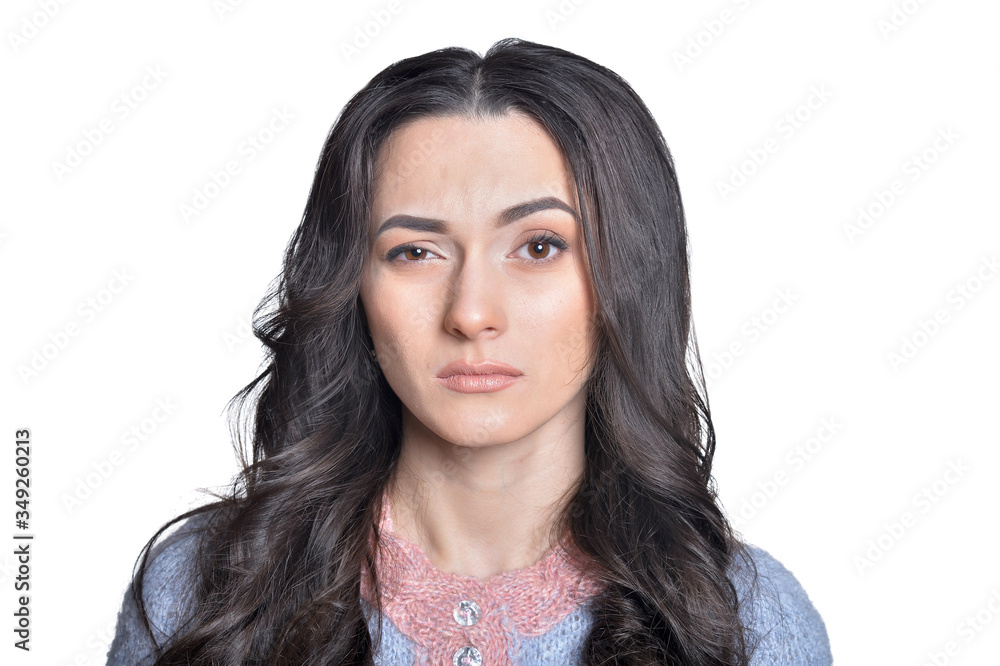 Portrait of beautiful sad woman posing isolated on white Portrait of beautiful sad woman posing isolated on white
