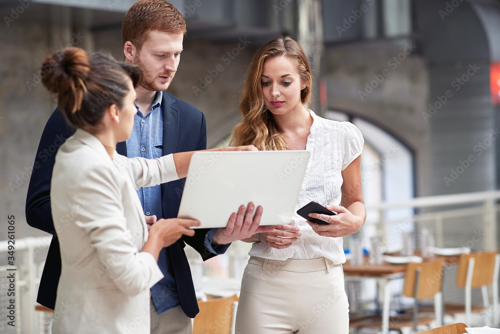 young female showing content on a laptop, explaining business idea. causal, business, presentation young female showing content on a laptop, explaining business idea. causal, business, presentation