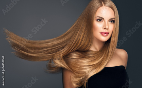 Obraz na plátně Beautiful model woman with shiny  and straight long hair