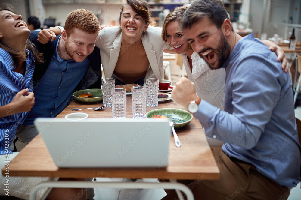 group of young caucasian people having a video call at lunch in restaurant, hugged. fun, technology, online, internet, friends, business partners, colleagues, hugging group of young caucasian people having a video call at lunch in restaurant, hugged. fun, technology, online, internet, friends, business partners, colleagues, hugging
