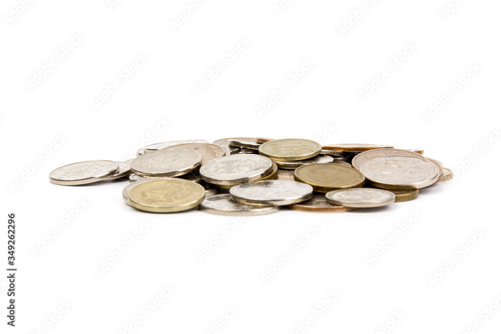 The coin on white background, concept of calculating expenses, incomes and expenses. The coin on white background, concept of calculating expenses, incomes and expenses.