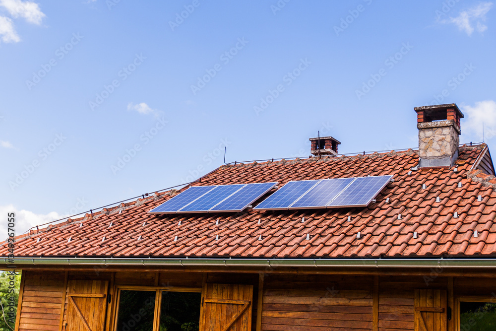Eco-friendly wooden house with solar panel