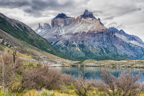 Epic beauty of the landscape - the National Park Torres del Paine in southern Chile. Lago Nordernskjold and mountains in the background photo