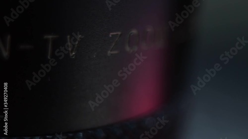 The inscription on the lens close up in the dark