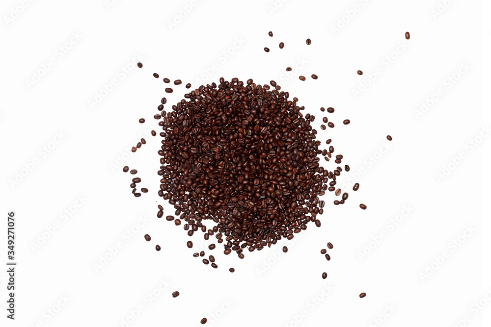 coffee abstraction. roasted coffee beans scattered on the surface on an empty white background. a large handful of coffee beans in the center of the frame coffee abstraction. roasted coffee beans scattered on the surface on an empty white background. a large handful of coffee beans in the center of the frame
