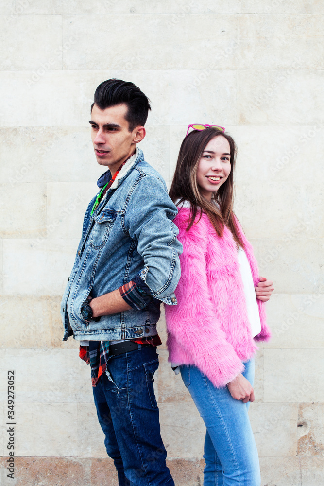 young pretty couple of student boy and girl together outside happy smiling, lifestyle people concept