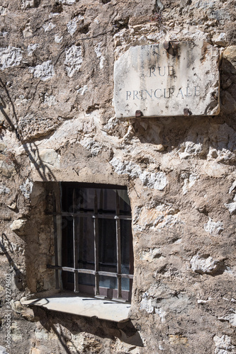 Old street sign at the hilltop Eze village, Cote d'Azur, Farnce photo