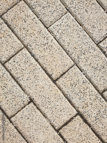 The Background from a gray sidewalk paving slabs