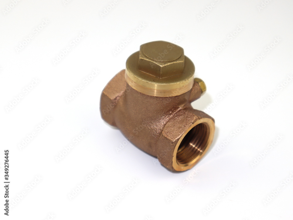 Swing check valve, brass isolated on white background Swing check valve, brass isolated on white background