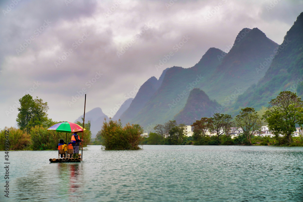 Bamboo boat ride on the Yulong River in Yangshuo, China