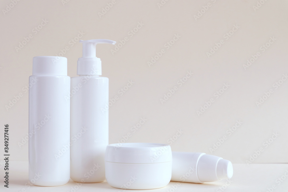 Bottle for cosmetic products without a label. The concept of skin care face. Bottle for cosmetic products without a label. The concept of skin care face.