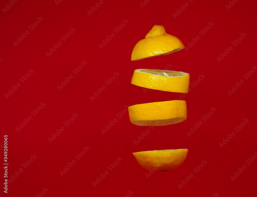 Lemon slices in red background Lemon slices in red background