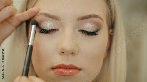 Wallpaper Mural Eye makeup woman applying eyeshadow powder. Beautiful woman face. Perfect makeup. Beauty fashion. Eyelashes. Cosmetic Eyeshadow. close up Torontodigital.ca