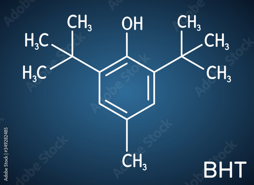 Butylated hydroxytoluene, BHT, dibutylhydroxytoluene molecule. It is lipophilic organic compound, antioxidant, food additive E321. Structural chemical formula on the dark blue background
