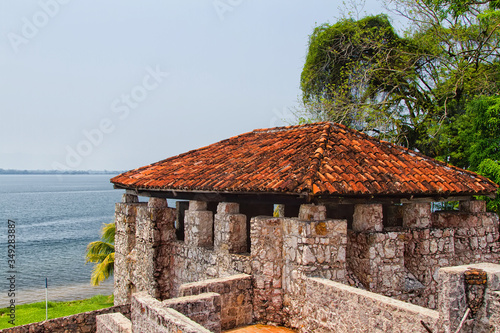 DIO DULCE, GUATEMALA - APRIL 25: Castillo de San Felipe de Lara, Rio Dulce, Guatemala on April 25, 2014. Castle was made due to protect the area from pirates plundering the caribeean coast. photo