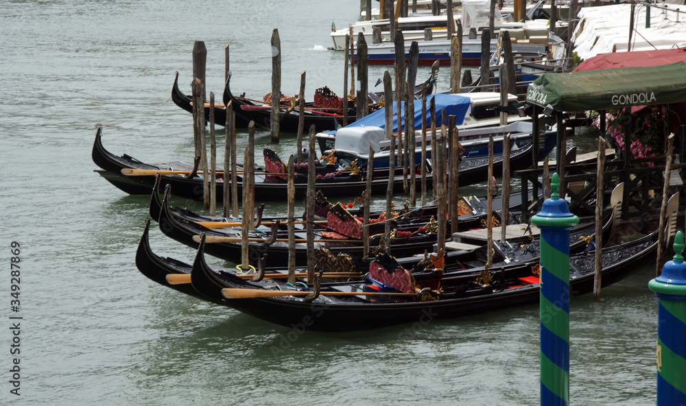 Photo of gondolas on grand canal. Postcard from Venice.