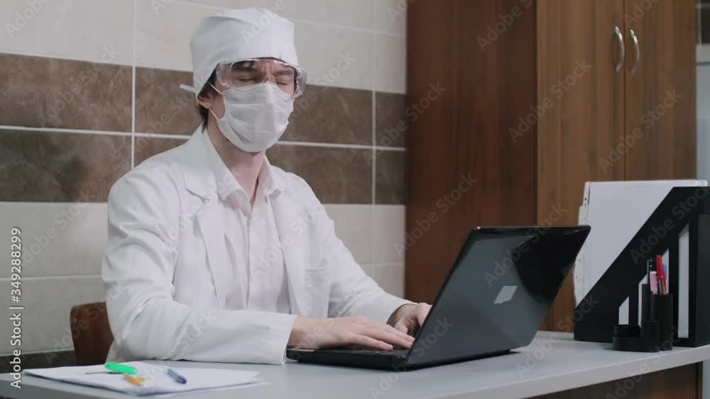A young doctor takes a patient's A young doctor takes a patient's