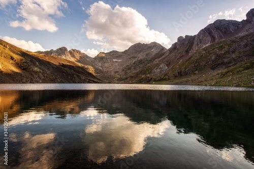 Beauty mountain lake with a mountain reflected in its waters at sunset, spanish pyrenees